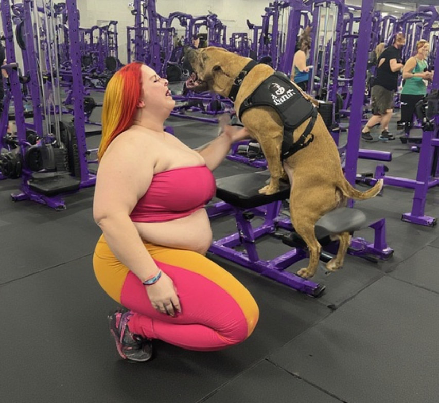 Woman with pet at gym